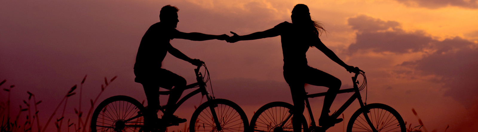 Couple riding bikes