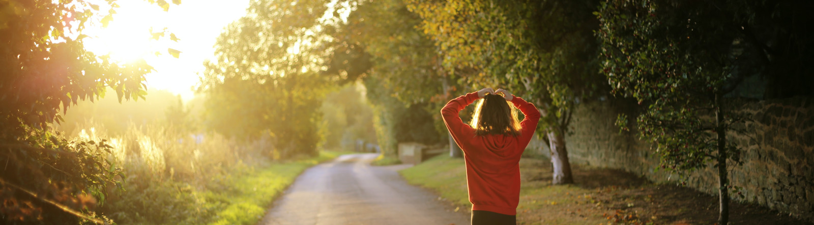 woman walking at sunset