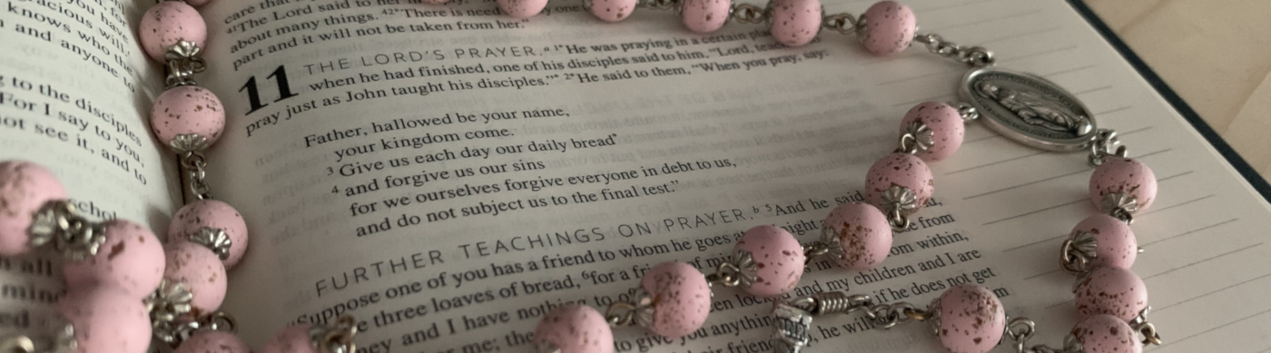 Bible with rosary